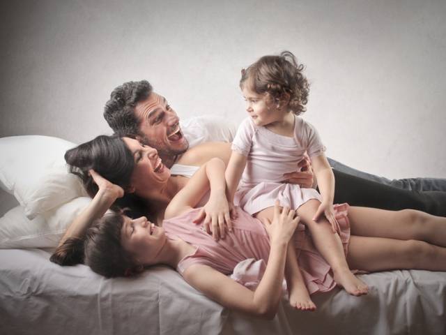 Familia feliz con el plan bucodental